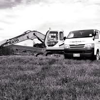 Kato excavator alongside the Auto Electricks branded van
